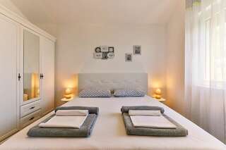 Апартаменты Apartmani VISUM Свети-Стефан Люкс, вид на море-26